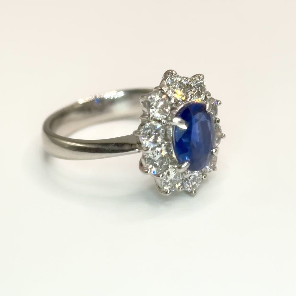 
                  
                    Load and play video in Gallery viewer, 1.29ct Oval Blue Sapphire w/Natural Diamond Halo Ring in Platinum
                  
                